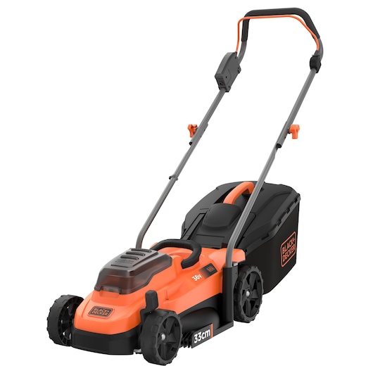 A BLACK+DECKER cordless lawn mower with an orange and black design, featuring a long handle, four wheels, and a grass collection box at the back.