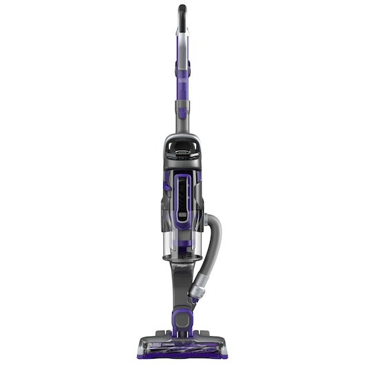 A BLACK+DECKER upright vacuum cleaner with a purple and grey color scheme, showing a transparent dust container and a hose attached on the side.