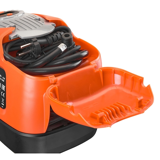 The on-board accessory storage space, containing AC power cable and air hose included with the BLACK+DECKER 160 PSI AC/DC Multi Purpose Air Station.