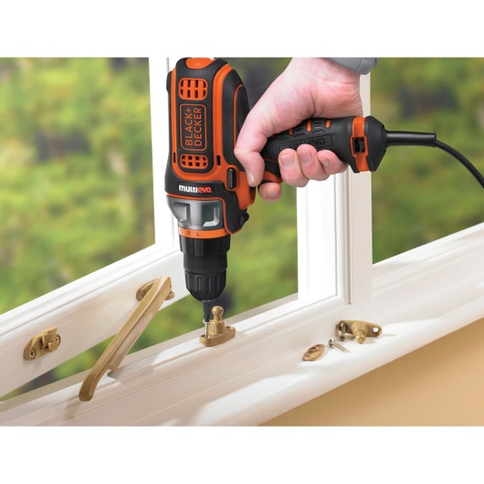 300W corded Multievo™ multi-tool with Drill Driver head and Double ended screwdriver bit in a Kitbox