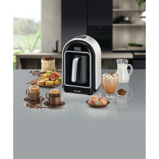 Automatic Turkish Coffee Maker Black and Decker distant view with Turkish coffee & deserts, milk and coffee beans in Kitchen set up