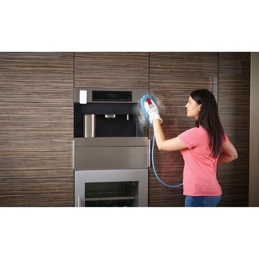 BLACKDECKER FSH10SMP steam cleaning glove used on kitchen appliance, action view.