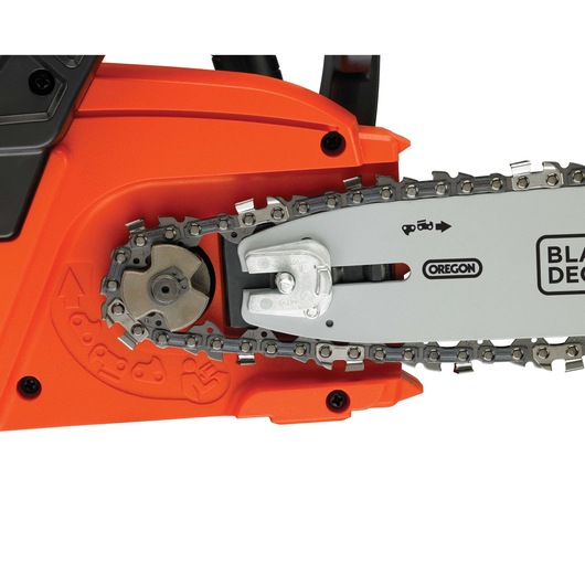 Close-up view of the chain and blade mechanism on an orange BLACK+DECKER chainsaw, featuring metal parts and branding details.