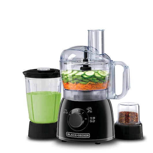 BLACK+DECKER food processor with three attachments: a main bowl containing sliced cucumbers and shredded carrots, a blender jar with green smoothie, and a small chopper filled with spices. The appliance has a black base and control dial.