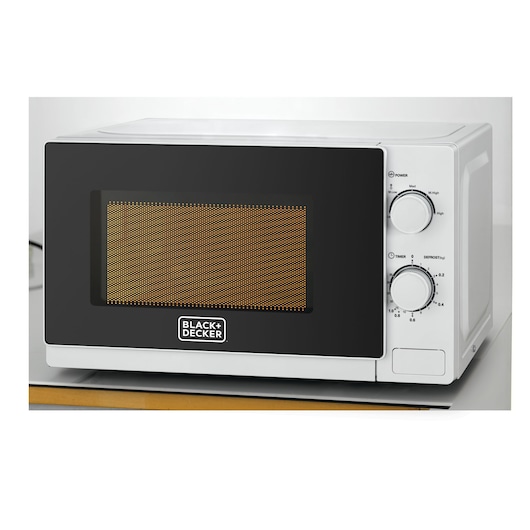 A BLACK+DECKER microwave oven with a black front panel and two control knobs on the right side, placed on a countertop.