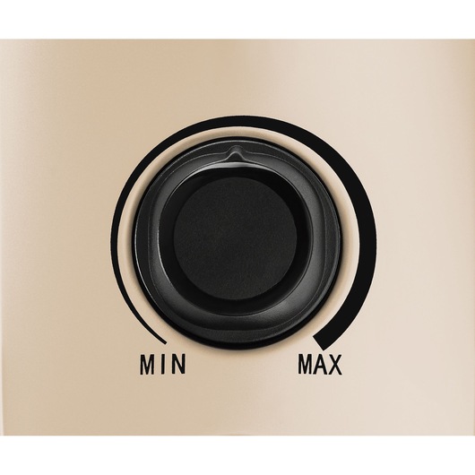 BLACKDECKER OR011FD control knob close-up showing min to max settings on beige surface.