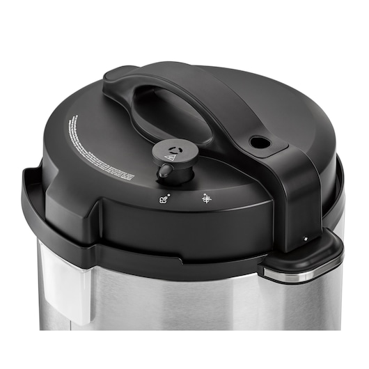BLACKDECKER PCP1000 electric pressure cooker with black lid and control knob, category photography, top angle.