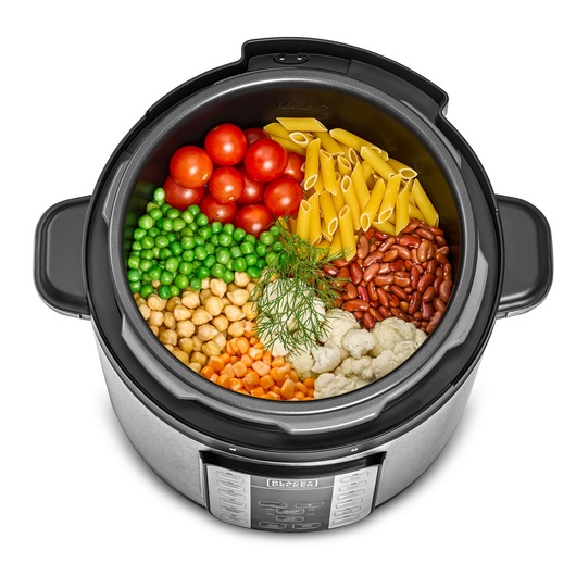BLACKDECKER PCP1000 multicooker top view with tomatoes, penne pasta, peas, beans, chickpeas, carrots, and cauliflower.