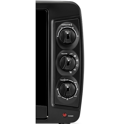 Close-up view of the control panel on a BLACK+DECKER kitchen appliance, featuring three knobs for temperature, function selector, and timer settings, along with a red power indicator.