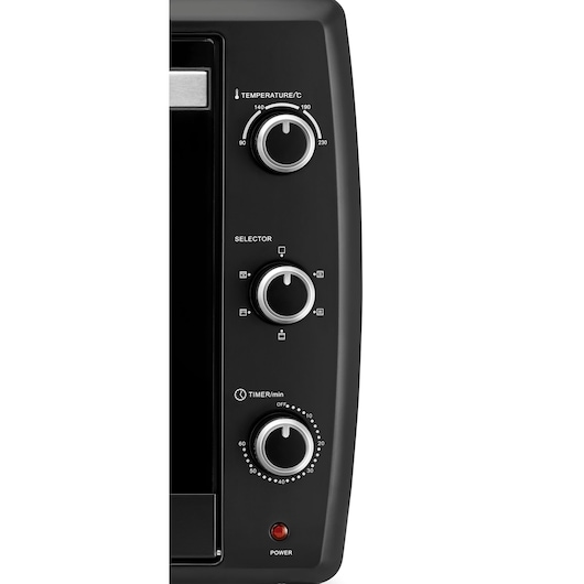 Close-up of the control panel of a BLACK+DECKER toaster oven, showing three silver knobs for temperature, function selector, and timer, along with a red power indicator light.