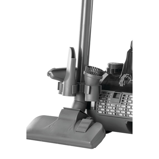 BLACKDECKER VM1480 vacuum cleaner base with attached hoses and brush accessory, side angle.